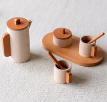Load image into Gallery viewer, A wooden tea set including a teapot, cups with saucers, a sugar pot, and a tray, displayed on a neutral background.
